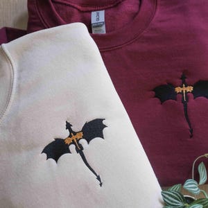 a couple of shirts that are on a table