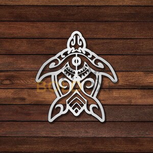 May include: White metal wall art depicting a stylized turtle with intricate Polynesian designs. The turtle is facing forward with its head raised and its shell detailed with geometric patterns.