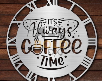May include: A silver metal clock with Roman numerals and the text "It's Always Coffee Time" in a stylized font. The clock face features a coffee cup with steam rising from it.