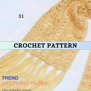 May include: Crochet pattern for a yellow crocheted scarf with fringe. The pattern is titled "TREND crocheted muffler" and "Gitta Schrade's vintage-."