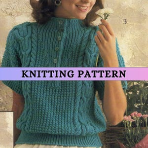 May include: Knitting pattern for a teal blue sweater with a cable knit design and a mock neck. The sweater has a button closure at the neck.