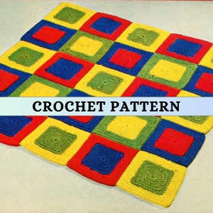 May include: A colorful crochet blanket featuring a patchwork design. The blanket is composed of squares in red, blue, yellow, and green. The text "CROCHET PATTERN" is displayed across the image. This handmade item is perfect for home decor.