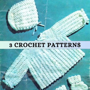 May include: Three crochet patterns for a baby sweater, hat, and booties. The patterns are all white and feature a delicate stitch.