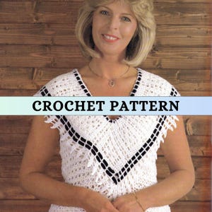 May include: A white crochet top with a V-neck and black trim. The top has an openwork pattern and is labelled "CROCHET PATTERN" across the image. The background is a wooden wall.