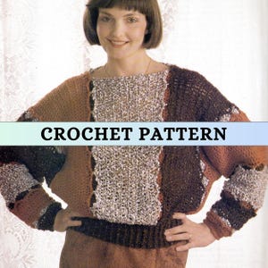 May include: A crochet pattern for a color-blocked sweater. The sweater features a mix of brown, tan, and silver yarn. The text "CROCHET PATTERN" is displayed across the image. The sweater has a boxy shape and long sleeves.