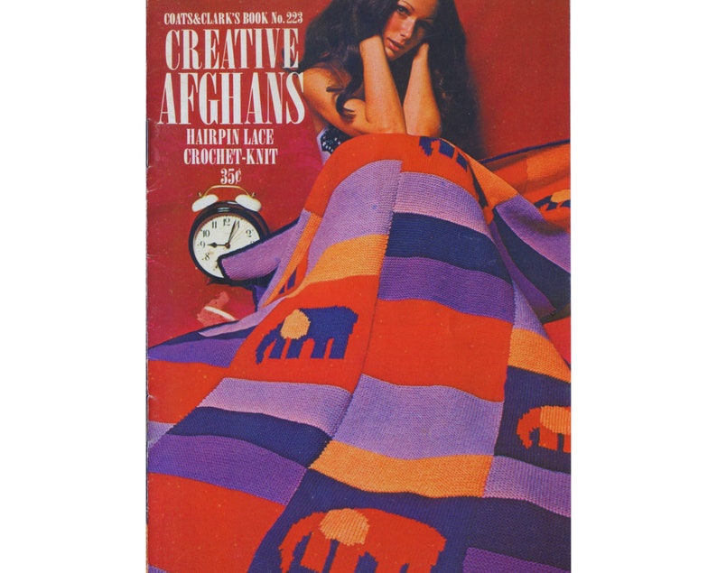 a woman sitting with a colorful blanket with elephant motif on her lap and a text that reads as creative afghans
