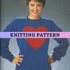 May include: Knitting pattern for a blue jumper with a red heart on the front. The pattern is titled "Knitting Pattern".