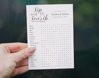 Op de afbeelding: Een witte kaart met een woordzoeker voor een huwelijksreceptie. De titel van de puzzel is "Sip and Search". De puzzel viert Jessica & James op 9 september 2026.