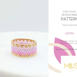 Könnte beinhalten: Ein rosafarbener und weißer Ombre-Perlenring mit goldener Einfassung. Der Ring ist aus Miyuki Delica 11/0 Perlen gefertigt und hat einen Durchmesser von 1,08 cm und einen Umfang von 6,04 cm. Das Muster heißt "Gemini" und ist ein gerader Peyote-Stich.