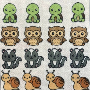 May include: A sheet of 20 colorful iron-on patches featuring various woodland animals, including foxes, turtles, owls, skunks, snails, and beavers. The patches are arranged in four rows of five, with each animal depicted in a cartoon style.