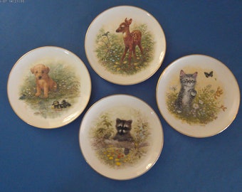 Set of Four "Innocent Encounters" collector plate series by Joseph Giordano