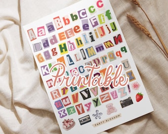 May include: Printable alphabet letters in various colors and fonts, cut out and arranged on a white background. The letters are surrounded by small decorative images, including a teddy bear, a camera, a strawberry, a flower, a cassette tape, and a cake.