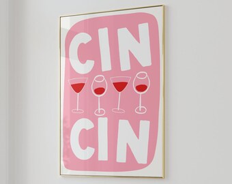 Puede incluir: Una impresión enmarcada rosa y blanca con el texto "CIN CIN" y cuatro copas de vino tinto con líquido rojo.