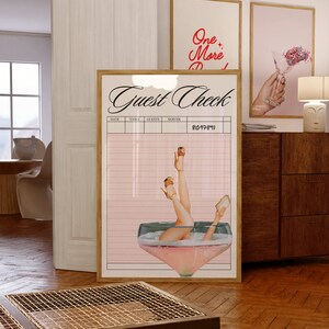 May include: A pink and white guest check with a retro illustration of a woman's legs in a champagne glass. The text "Guest Check" is written in black cursive font.