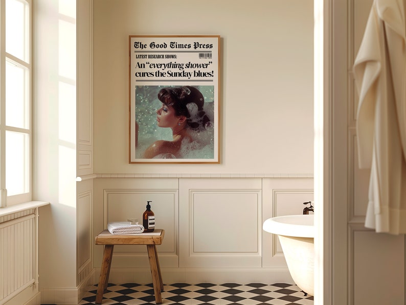 May include: A framed print of a vintage newspaper article with the headline "The Good Times Press" and the subheading "LATEST RESEARCH SHOWS: An 'everything shower' cures the Sunday blues!" The image shows a woman in a bathtub with bubbles.