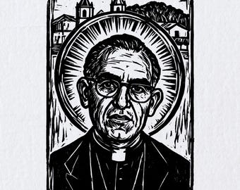 May include: A black and white linocut print depicting a portrait of a man wearing glasses and a clerical collar. Behind the figure is a circular halo and a background featuring two church steeples and trees, all enclosed within a rectangular border.