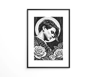 May include: A black and white framed print featuring a linocut-style illustration of a person with short hair in profile, surrounded by three blooming roses. A circular halo with radiating lines sits behind the head against a dark background.