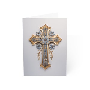 May include: A blue and gold cross with floral accents. The cross is ornate and detailed, with a delicate floral design.