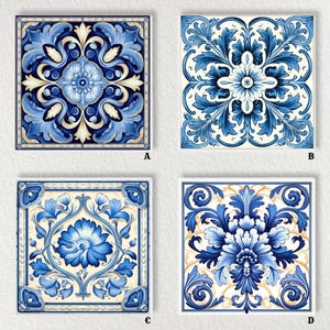 May include: Four square ceramic tiles with detailed blue and white floral patterns. Each tile displays a unique symmetrical design, featuring stylized flowers and swirling leaves. The tiles are set against a neutral background.