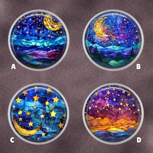 May include: Four round, glass-covered pendants with night sky designs. Each features a different stained-glass style depiction of a moon and stars over a landscape. The color palettes include blues, purples, and yellows.