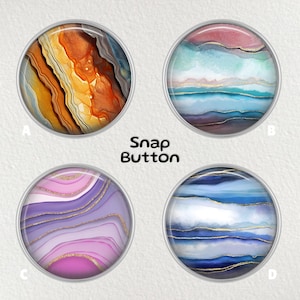 May include: Four round snap buttons with abstract designs. The designs include a mix of colors like orange, blue, purple, and gold. The text "Snap Button" is in the center of the image. Each button has a silver metal border.