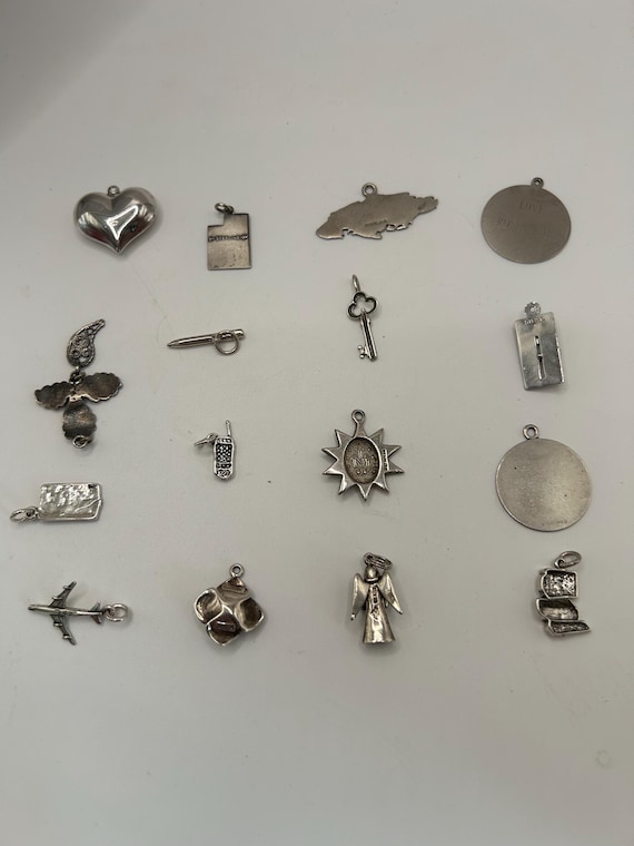 various charms - some sterling some vintage