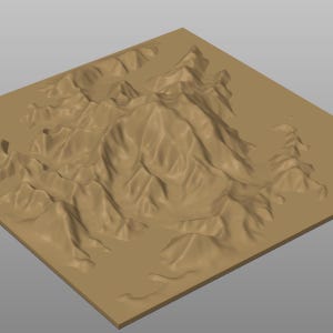 May include: A tan-coloured, 3D-rendered model of a mountainous landscape. The model features detailed ridges, valleys, and peaks, with a flat, rectangular base. The design suggests a topographical representation.