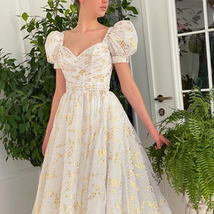 Gold flowy prom best sale dress
