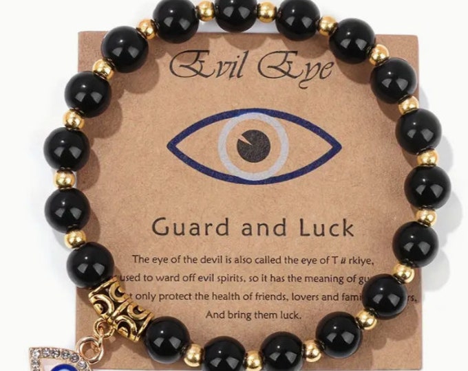 Black beaded bracelet with Evil Eye
