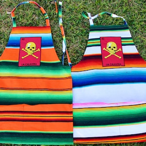 La Calavera Mexican Loteria Sarape 1 Apron 1 Mandil. (colors may vary from image) Mandil color vary Unisex 1 Calavera Mexican loteria