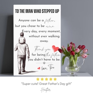 May include: A white canvas print with the text "TO THE MAN WHO STEPPED UP" and a drawing of a father carrying a child on his shoulders. The print includes a message of gratitude and is accompanied by a bouquet of pink and red tulips in a glass vase.