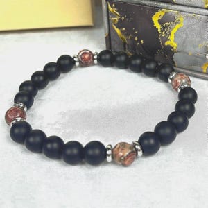 Men’s Black Onyx Stretch Bracelet with Copper and Green Jasper Gemstone Beads and Silver Stainless Steel Beads. Comes Boxed.