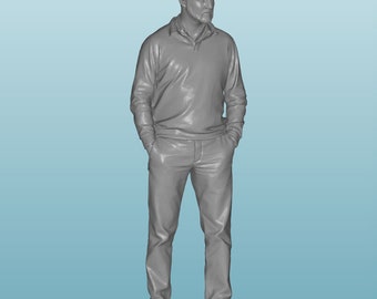 May include: A gray 3D printed figurine of a person standing with their hands in their pockets. The person is wearing a collared shirt and pants.