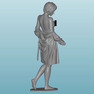 May include: A grey figurine of a person wearing a robe. The robe is open at the front, revealing the person's bare torso. The person is standing with one leg slightly bent and the other leg straight. The figurine is posed as if the person is walking.