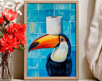 May include: Framed artwork featuring a toucan with a roll of toilet paper balanced on its beak. The toucan has a large orange and yellow beak, blue eye, and black and white plumage. The background is a blue tile pattern.