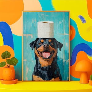 May include: A framed painting of a Rottweiler dog with a roll of toilet paper balanced on its head. The dog has a happy expression with its tongue out. The background is a light blue with a textured appearance.