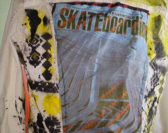Spray painted transworld skateboard jacket