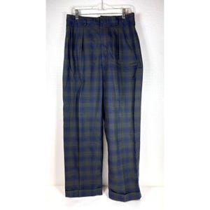 May include: High-waisted trousers featuring a dark blue and olive green plaid pattern. These pants include a structured waistband with belt loops, a front zipper fly, and two vertical pleats on each side. The legs are straight with cuffed hems.