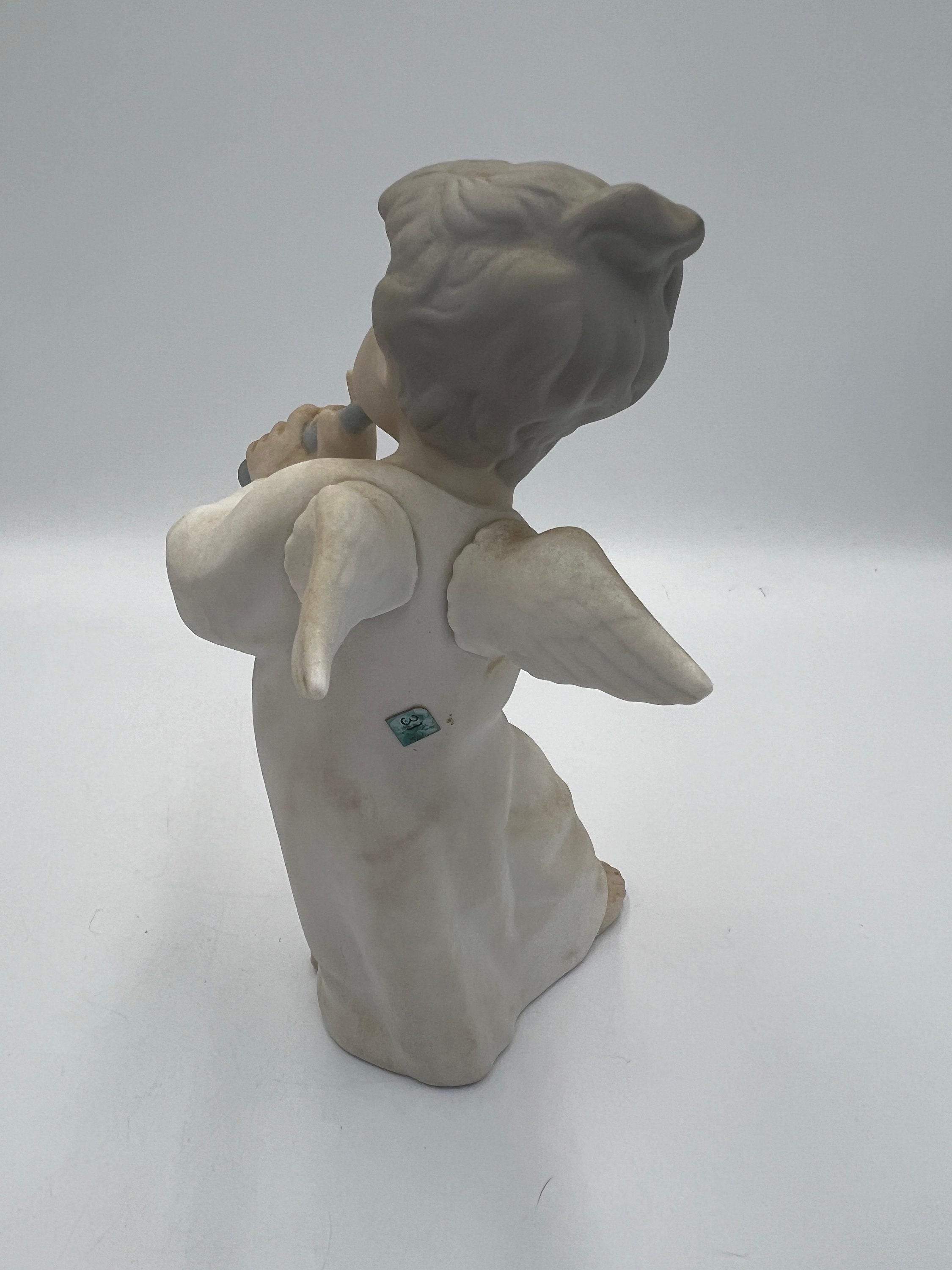 リヤドロの天使の置物：フルートを演奏するヴィンテージ磁器 - Etsy 日本