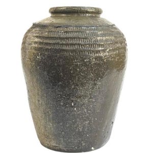 May include: A dark brown, wide-bodied ceramic jar with a short, narrow neck and a thick, rounded rim. The upper portion of the jar features a series of horizontal, incised, textured lines encircling the body, while the lower section is smooth.