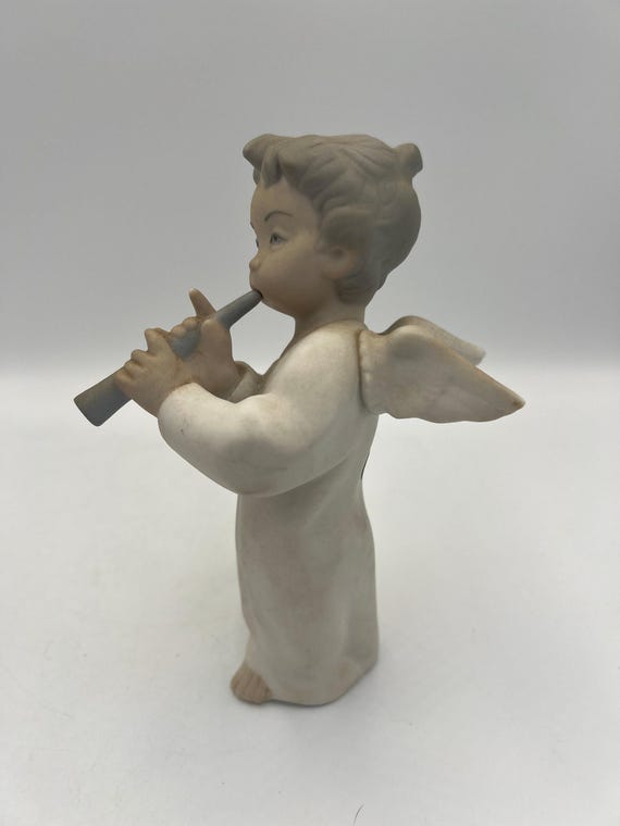 リヤドロの天使の置物：フルートを演奏するヴィンテージ磁器 - Etsy 日本