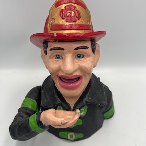 Design Toscano Fireman&#39;s Fund Banco de moedas mecânico de ferro fundido