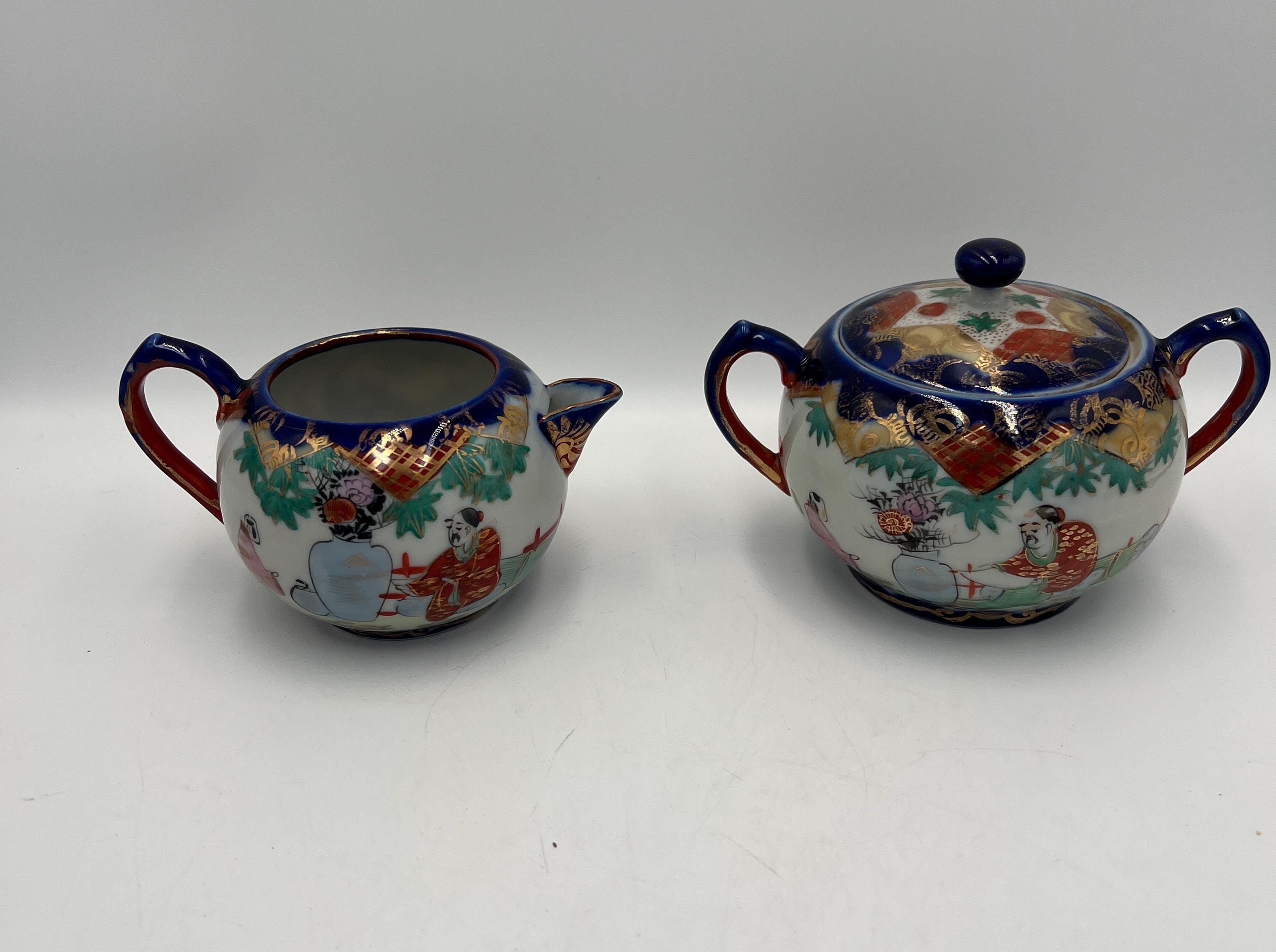 ヴィンテージの九谷焼または芸者焼のクリーマーとシュガーボウル