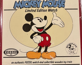 Montre Mickey Mouse Montre fossile Disney et train jouet en bois LI 1452 1994, 4205/15000