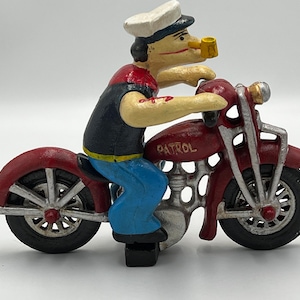 Zabawka motocyklowa Hubley z żeliwa z lat 30. XX wieku Popeye z żeliwa, replika