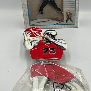 Reloj de péndulo de Michael Jordan Chicago Bulls con patas oscilantes, nuevo en caja