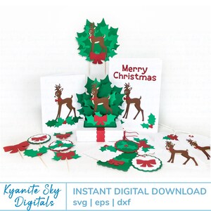 May include: A collection of Christmas-themed paper cutouts featuring reindeer, holly, and bows. The designs include reindeer in green holly wreaths, on cards with "Merry Christmas" text, and as cupcake toppers. Red, green, and white are the primary colors.