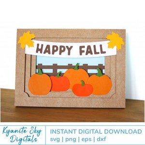 May include: A digital download of a craft project featuring a banner with the text "HAPPY FALL" and a scene of pumpkins in front of a fence. The design is perfect for creating autumn-themed cards, scrapbook pages, or other crafts.