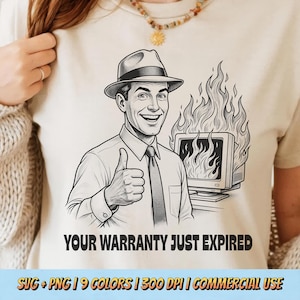 May include: A cream-coloured t-shirt featuring a black and white graphic of a smiling person in a fedora giving a thumbs up next to a computer monitor engulfed in flames, with the text "YOUR WARRANTY JUST EXPIRED" printed below the graphic.