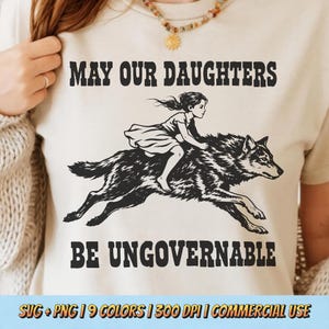 May Our Daughters Be Ungovernable PNG SVG - Feminist Empowerment Freedom Rebel Spirit Retro Vintage Sublimation Graphic T-Shirt Design